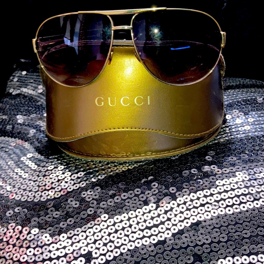 Gucci Sun Glasses Gold and Black Trim